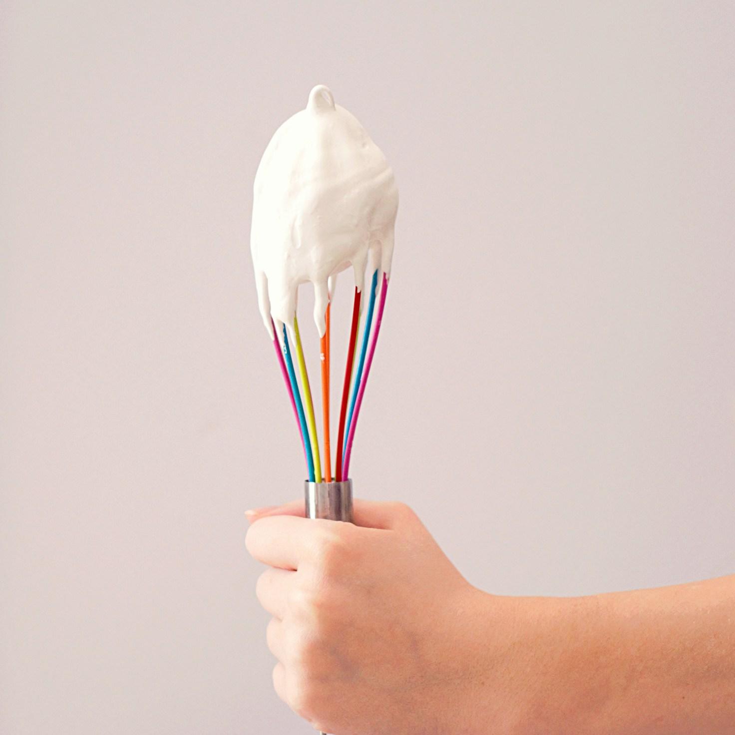 Diverse group of community members sharing a meal together, showcasing the social bonds formed through collaborative cooking